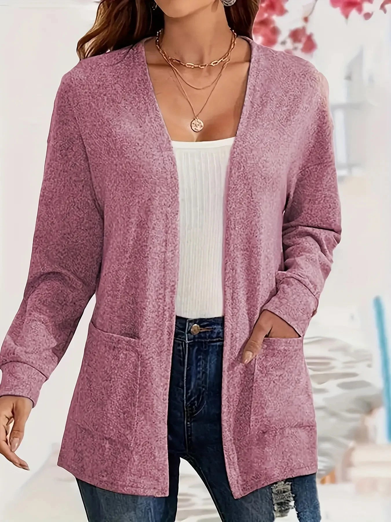 Autumn and winter European and American foreign trade thin fashion solid color pocket thin knitted women's buttonless cardigan