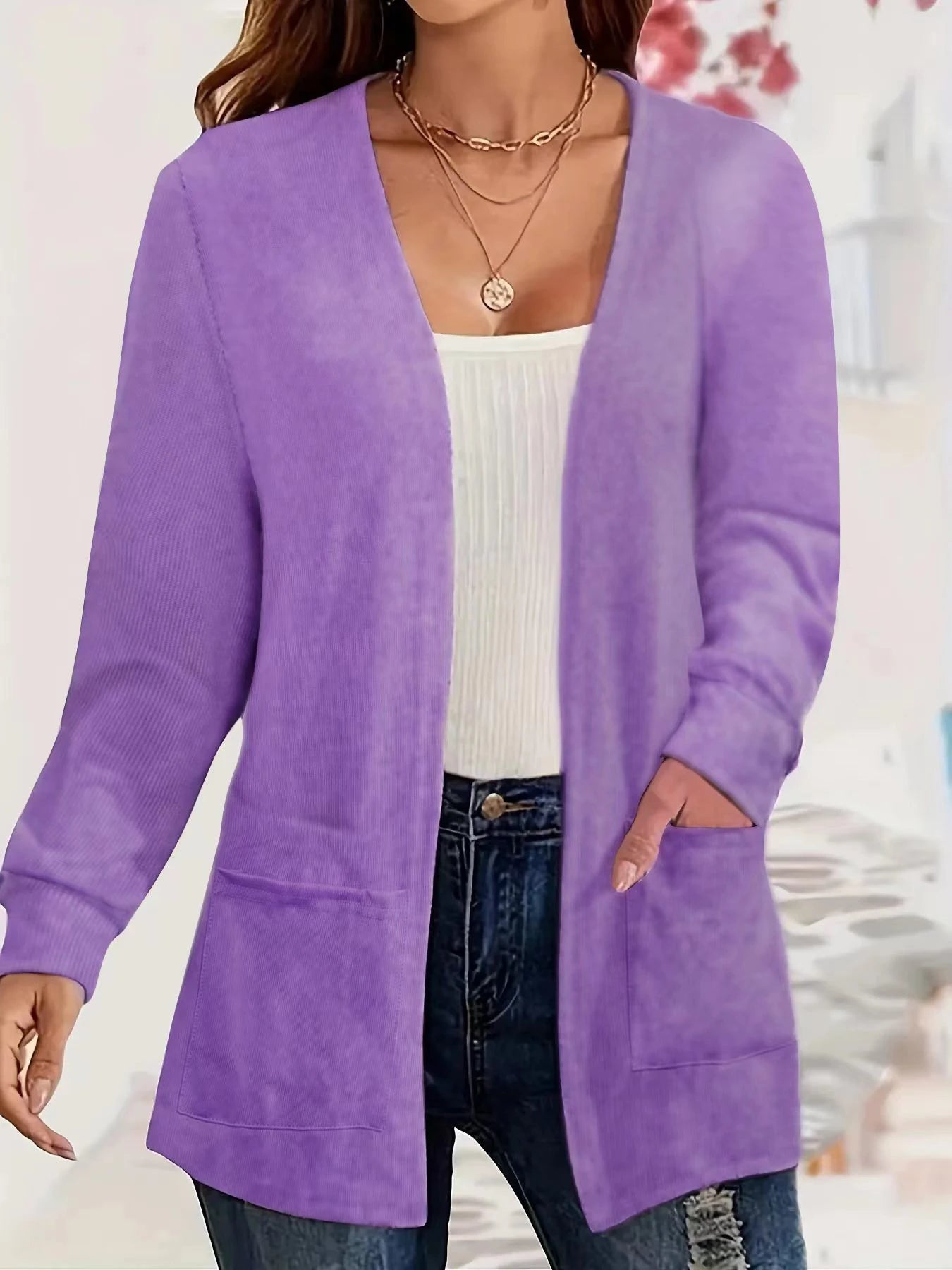Autumn and winter European and American foreign trade thin fashion solid color pocket thin knitted women's buttonless cardigan